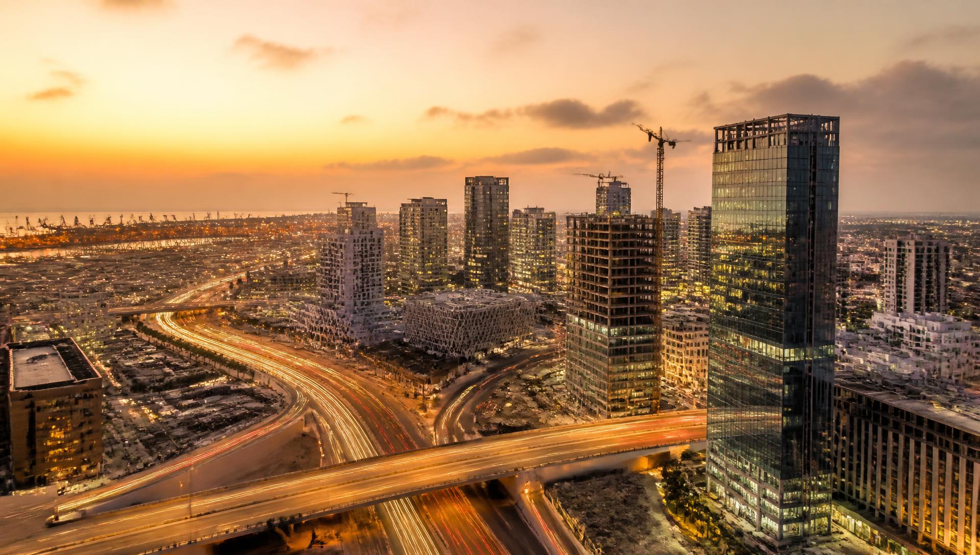 Aerial view of a growing African city with infrastructure under development